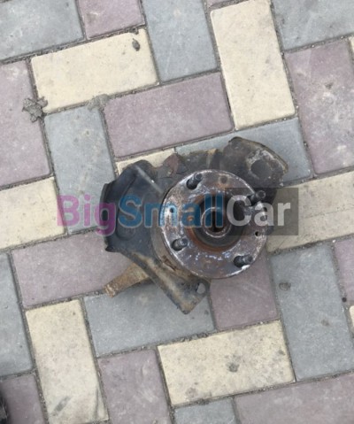 Поворотный кулак левый KIA Cerato 1